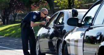 Police pulling over car