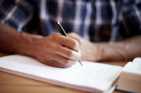 man with pen