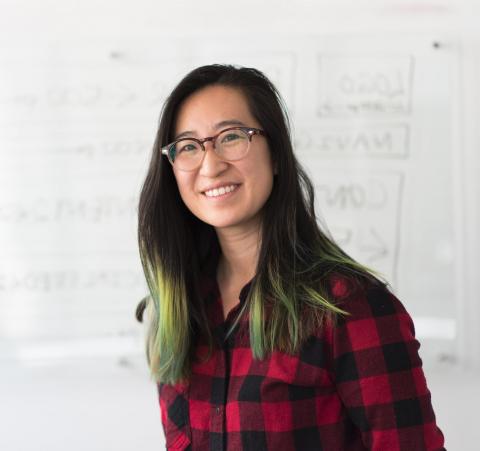 woman by whiteboard