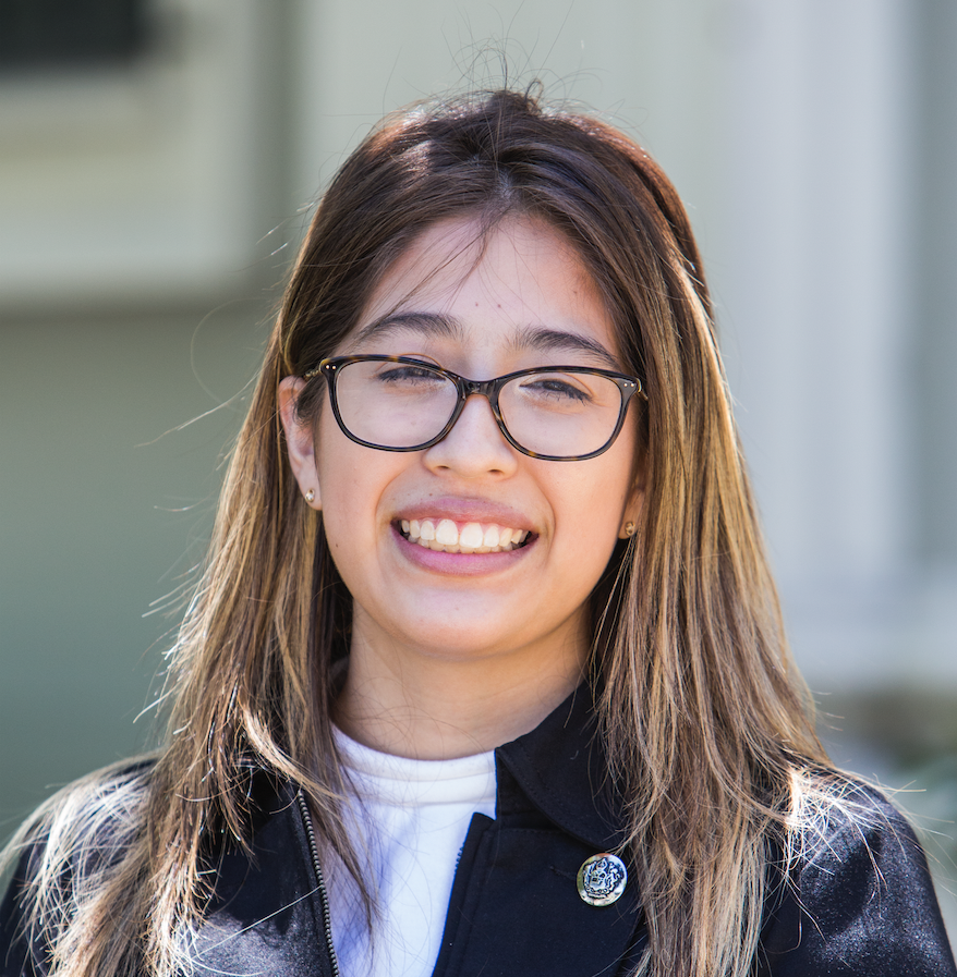 Picture of Evelyn Pedraza, USF Fellow, smiling at the camera